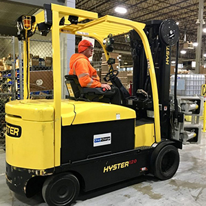 Hyster lift truck with an attachment powered by OneCharge lithium battery